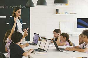 Teacher using game-based learning in her blended learning classroom