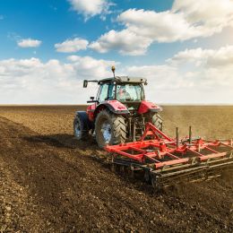 tractor plowing a field