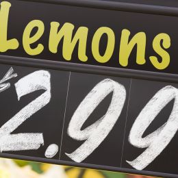 Sign showing price of lemons for $2.99