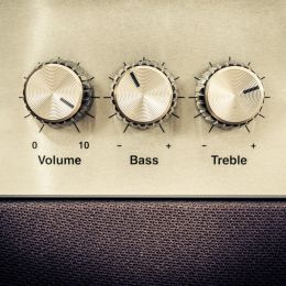 volume, bass, and treble controls on a speaker