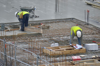 construction workers on a quadrant
